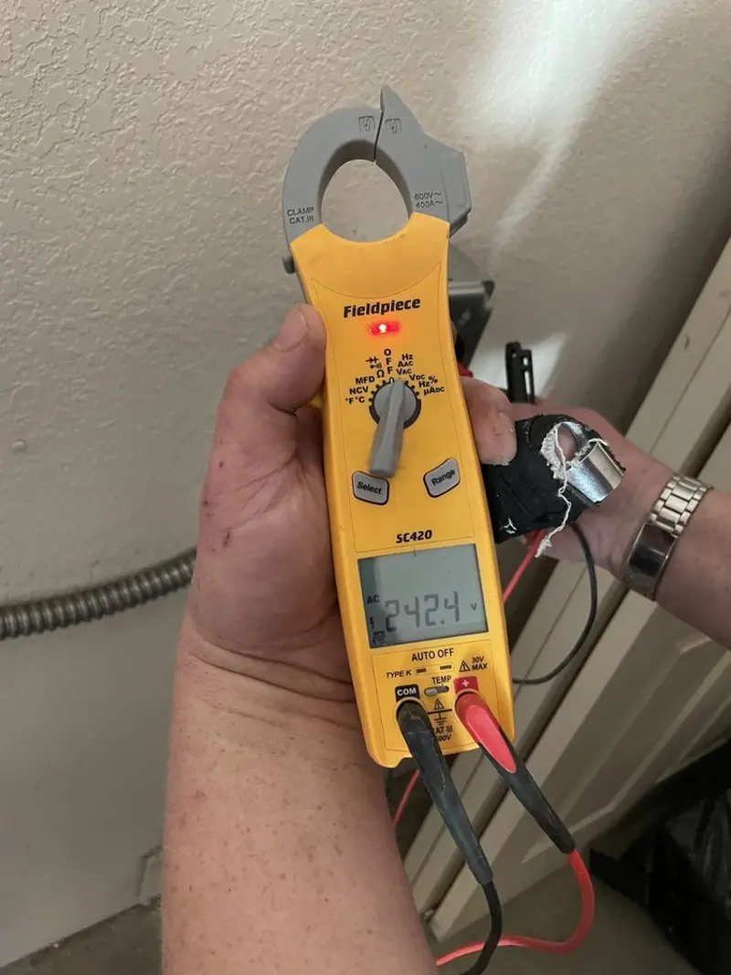 Voltage testing with clamp meter during Aluminum Wiring Replacement in Cleveland